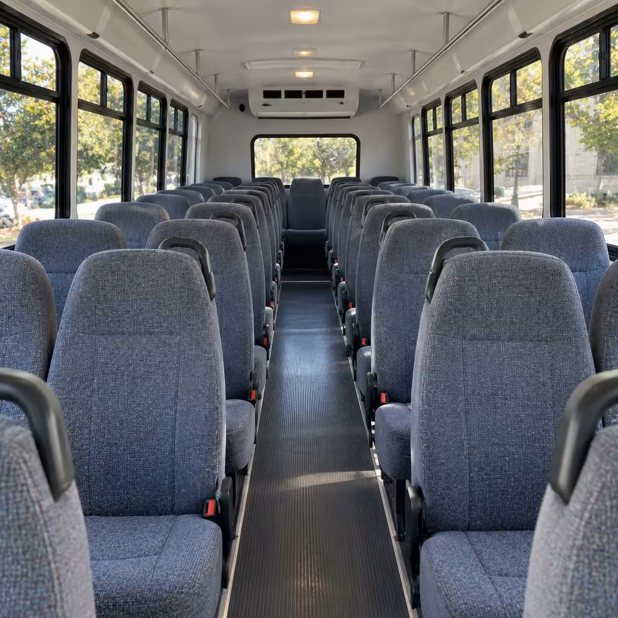 group boarding a minibus in missouri city